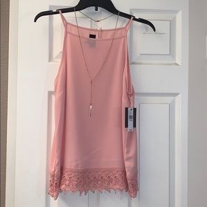 Pink blouse with necklace